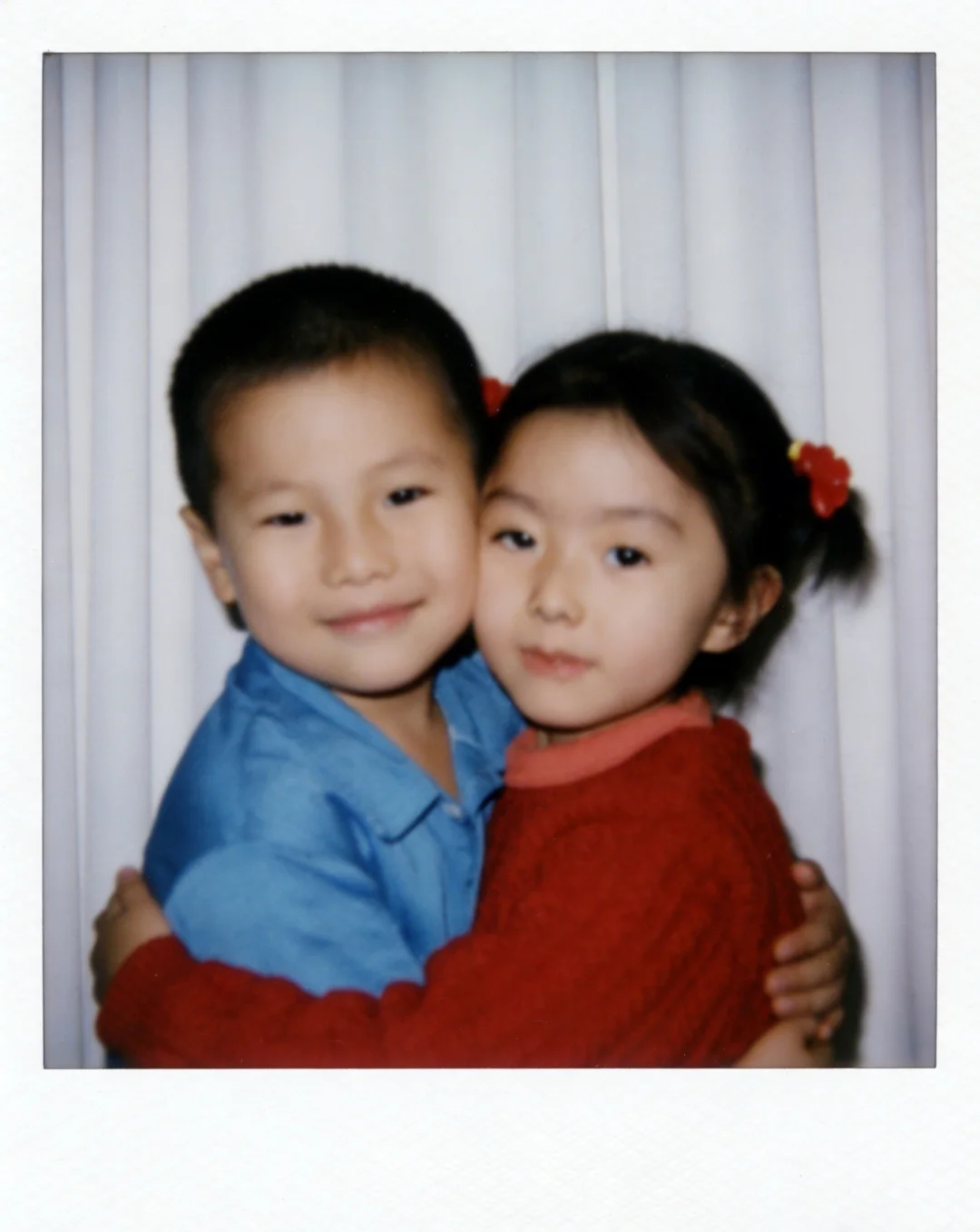 A childhood photo of me and my wife taken with Ai: camera: